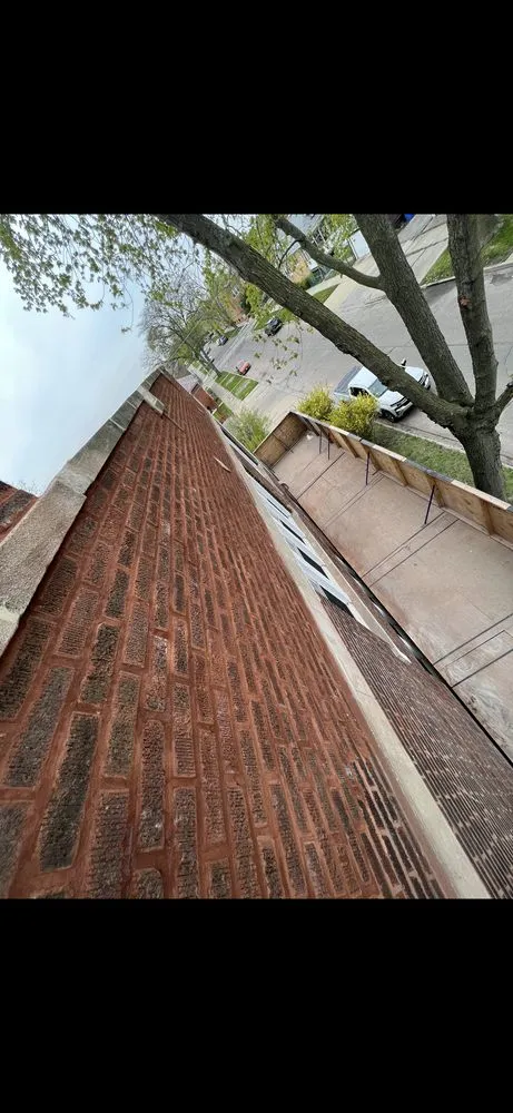 Slide of Leo's Roofing & Masonry