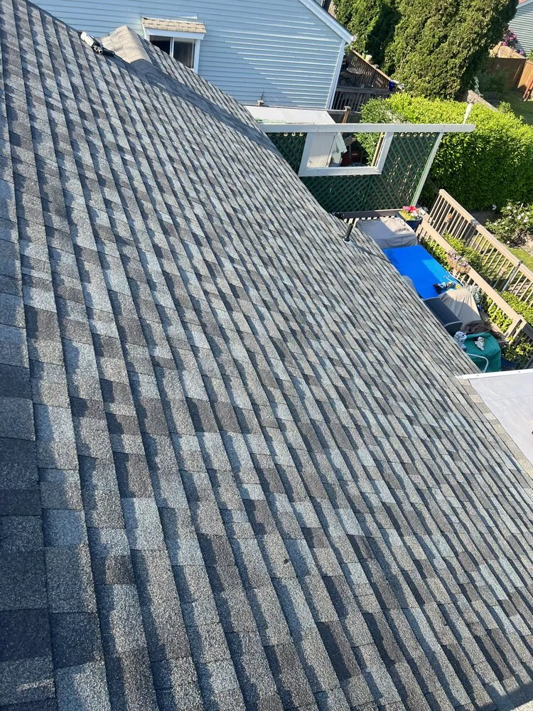 Slide of Leo's Roofing