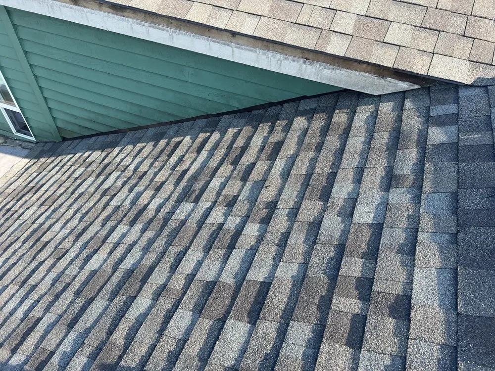 Slide of Leo's Roofing