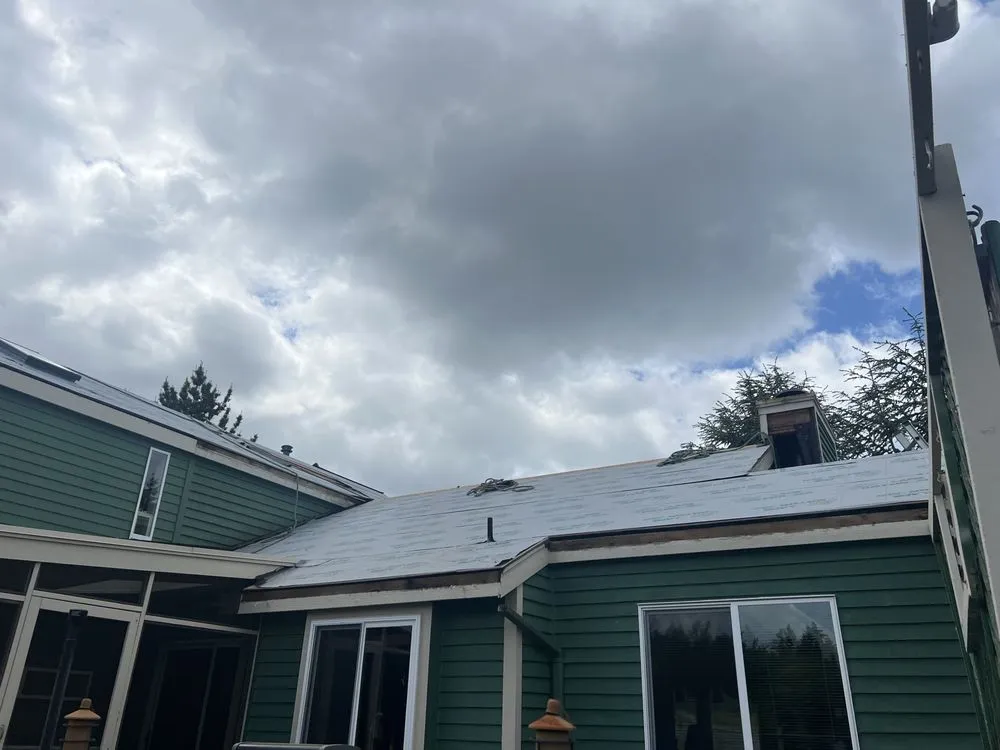 Slide of Leo's Roofing