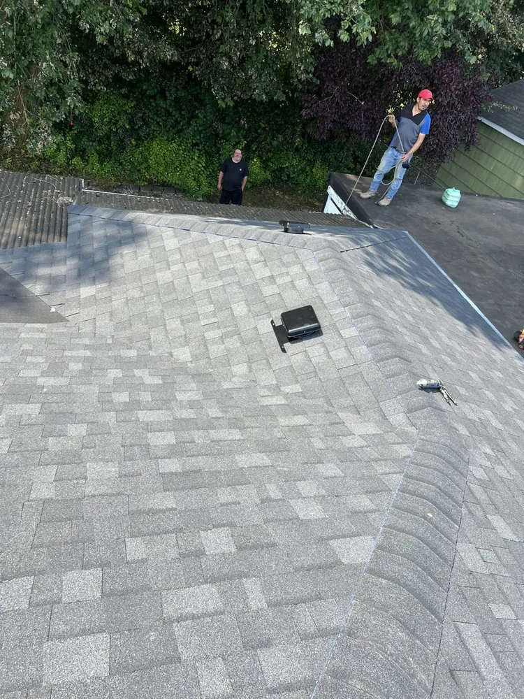 Slide of Leo's Roofing