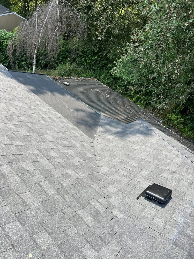 Slide of Leo's Roofing