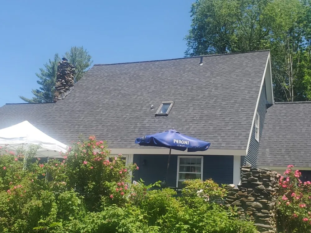 Slide of Leo's Roofing