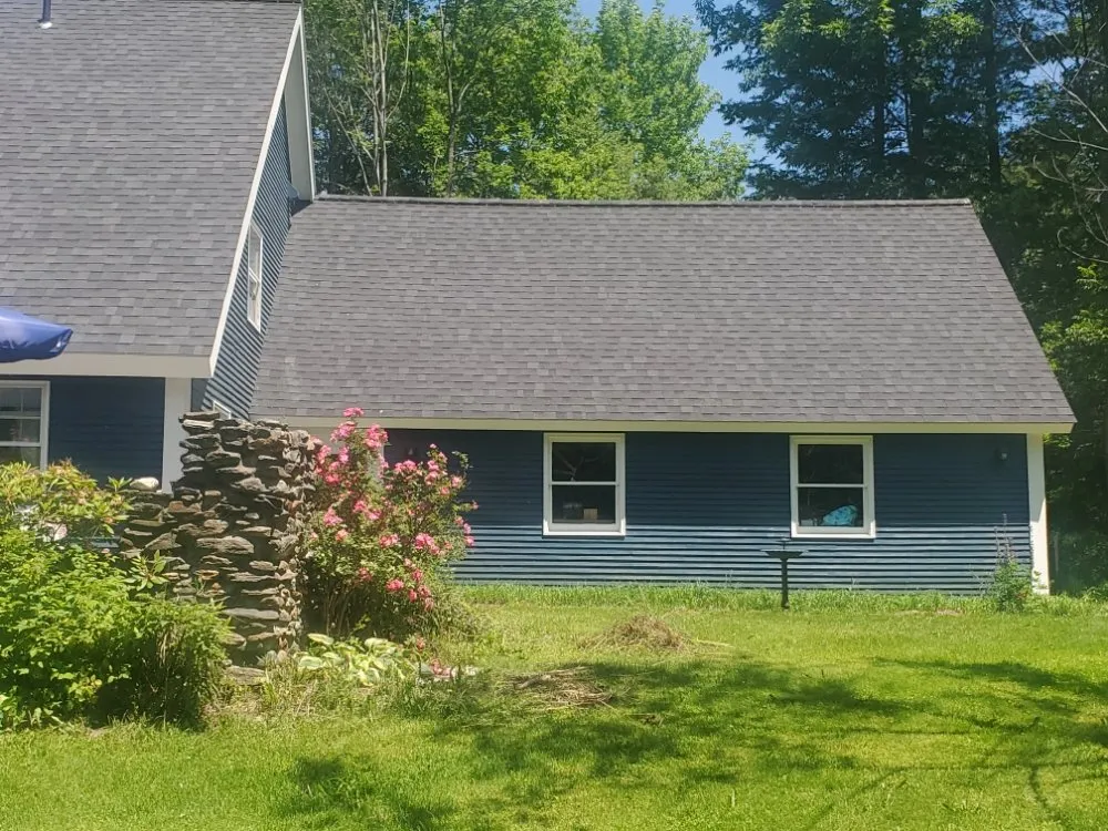 Slide of Leo's Roofing