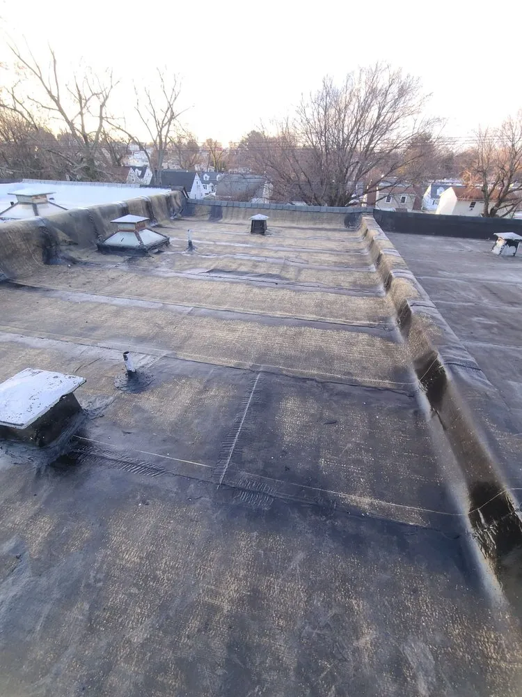 Slide of Leo's Roofing