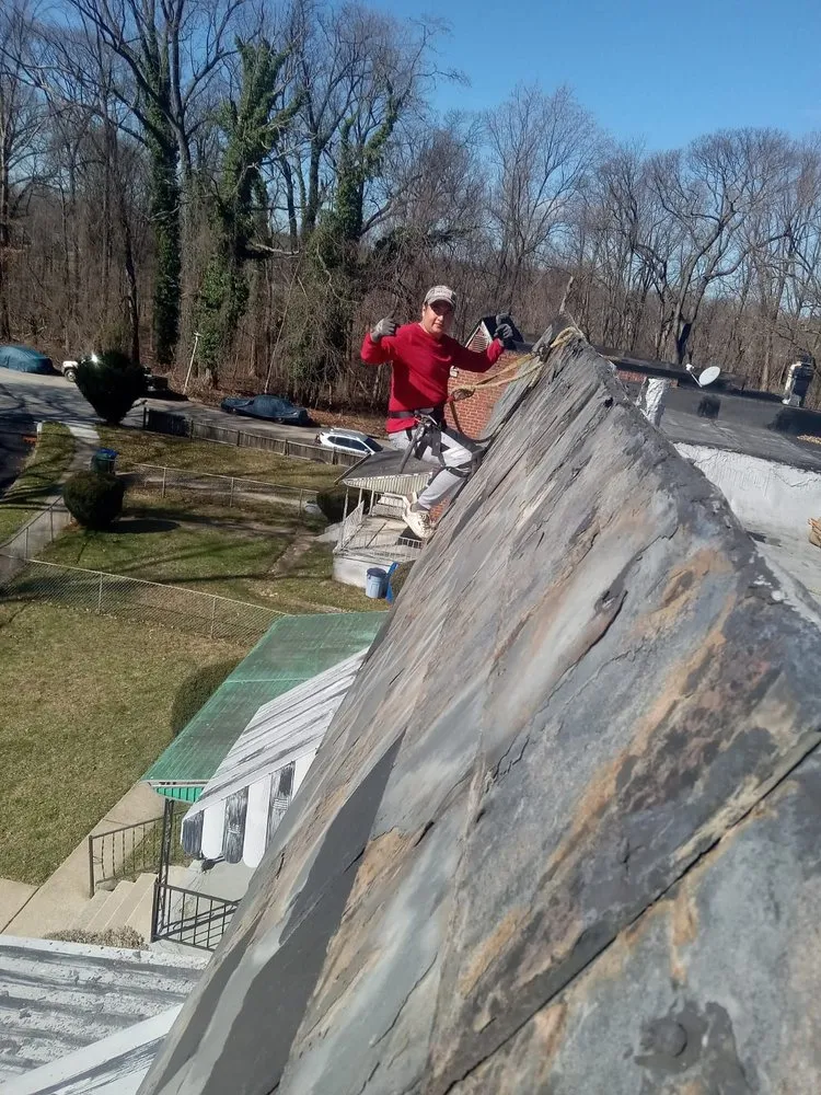 Slide of Leo's Roofing