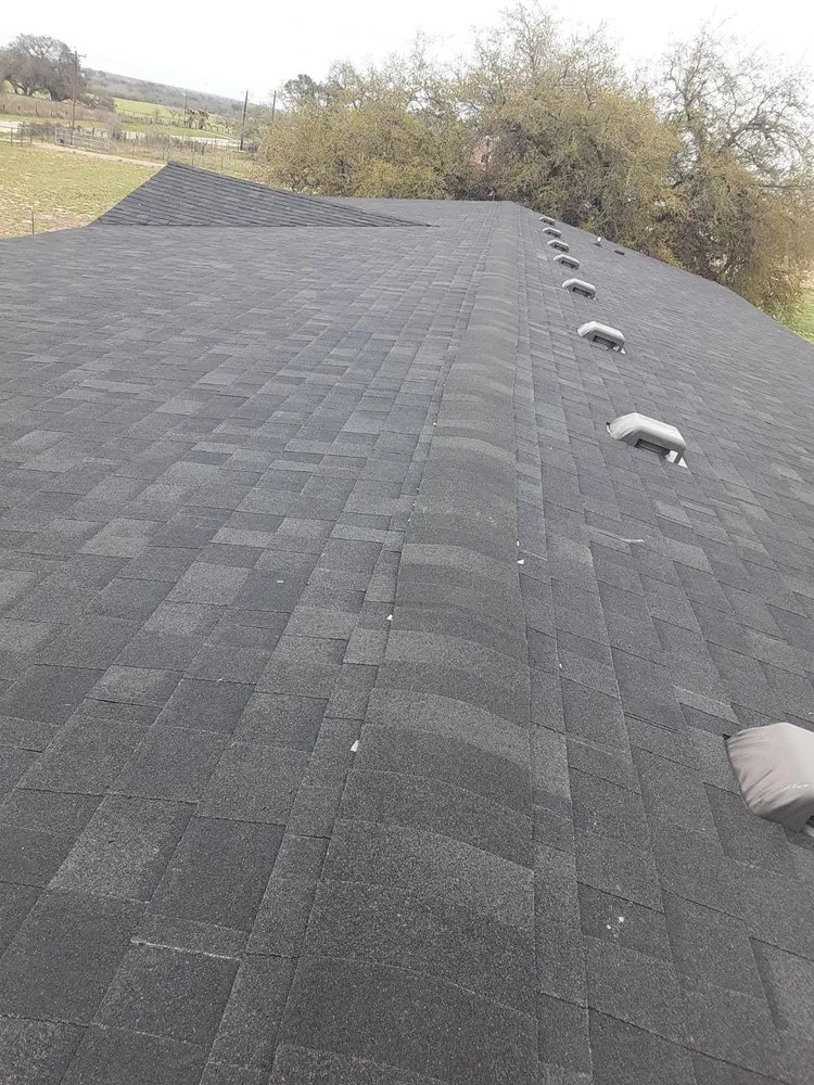 Slide of Leo's S & S Roofing