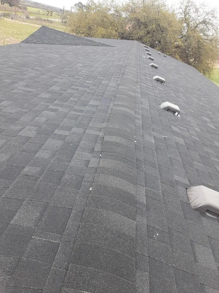 Slide of Leo's S & S Roofing