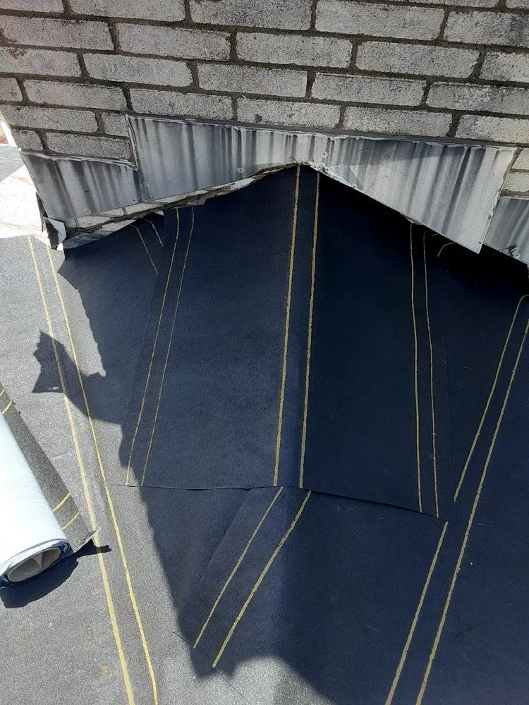 Slide of Leo's S & S Roofing