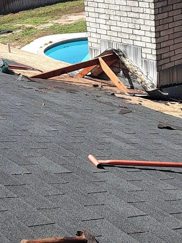 Slide of Leo's S & S Roofing