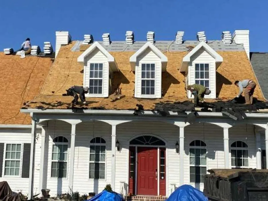 Slide of Les Norris Roofing