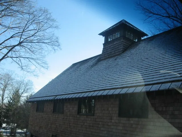 Slide of Leslie Roofing