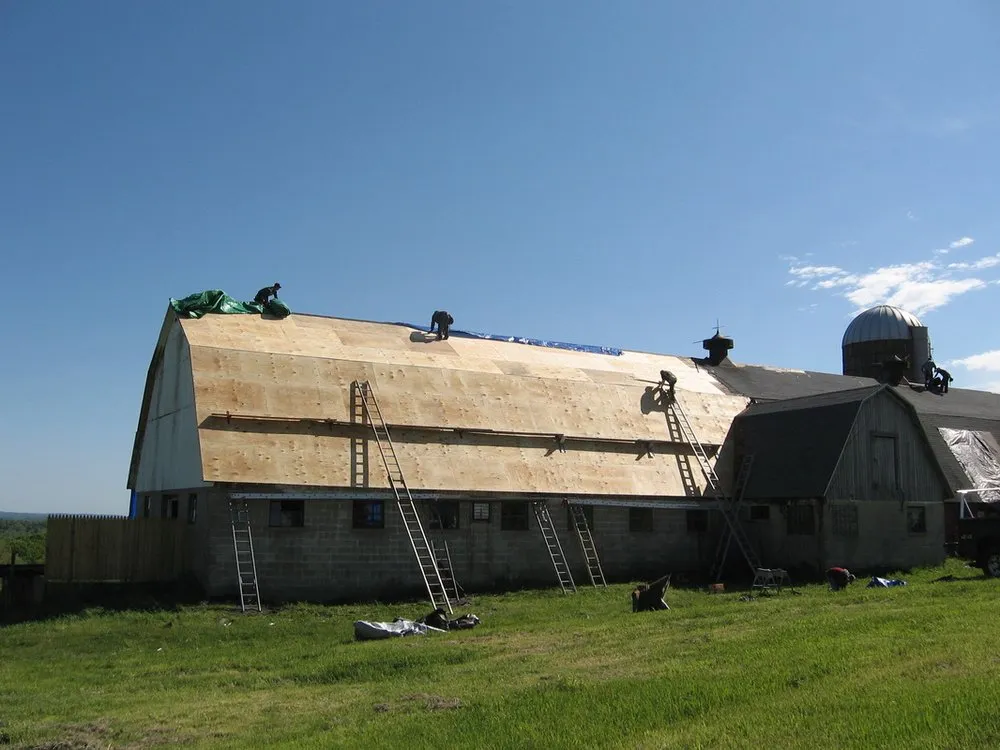 Slide of Leslie Roofing