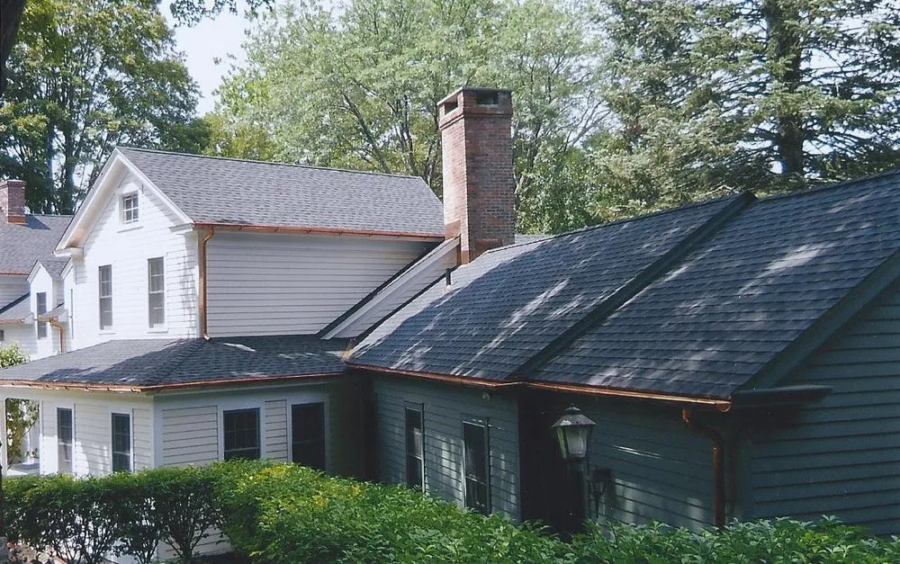 Slide of Leslie Roofing