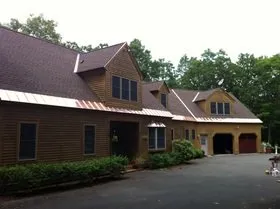 Slide of Leslie Roofing