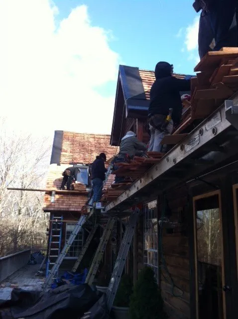 Slide of Leslie Roofing