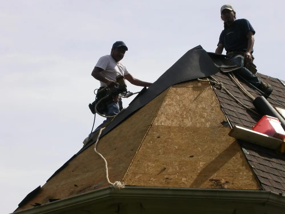Slide of Leslies Roofing