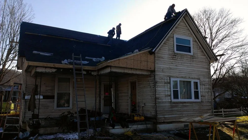 Slide of Let Me Do It Construction