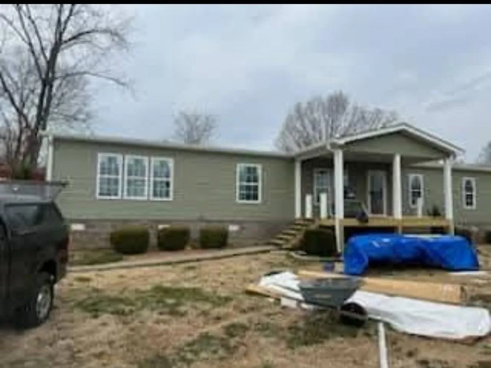 Slide of Lewis Brothers Roofing Siding & Guttering