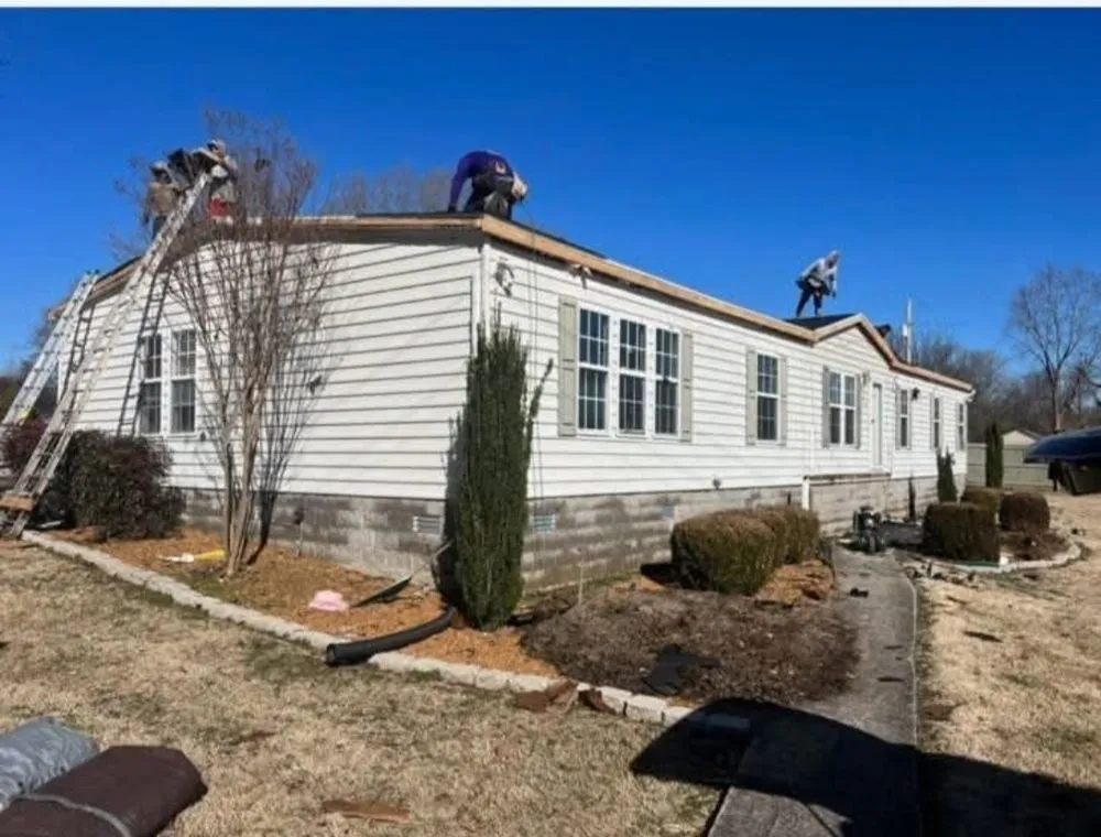 Slide of Lewis Brothers Roofing Siding & Guttering
