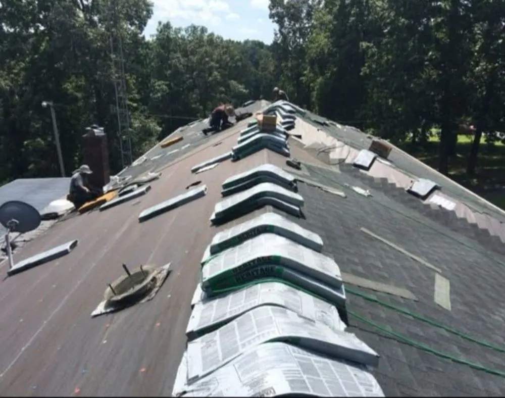 Slide of Lewis Brothers Roofing Siding & Guttering