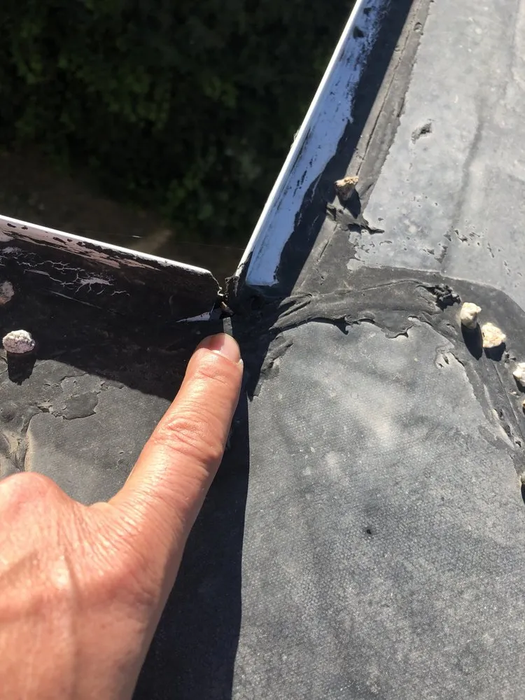 Slide of Lewis Roofing