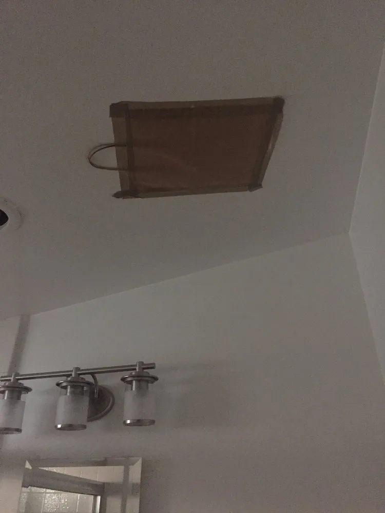 Slide of Lewis Roofing