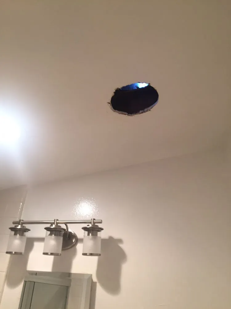 Slide of Lewis Roofing