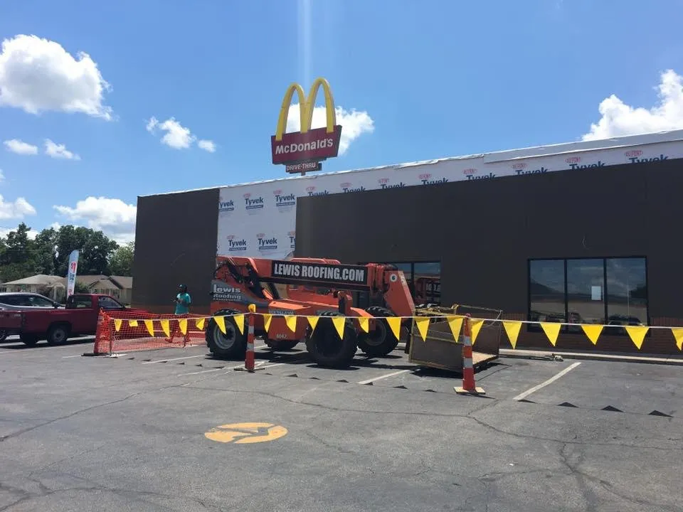 Slide of Lewis Roofing