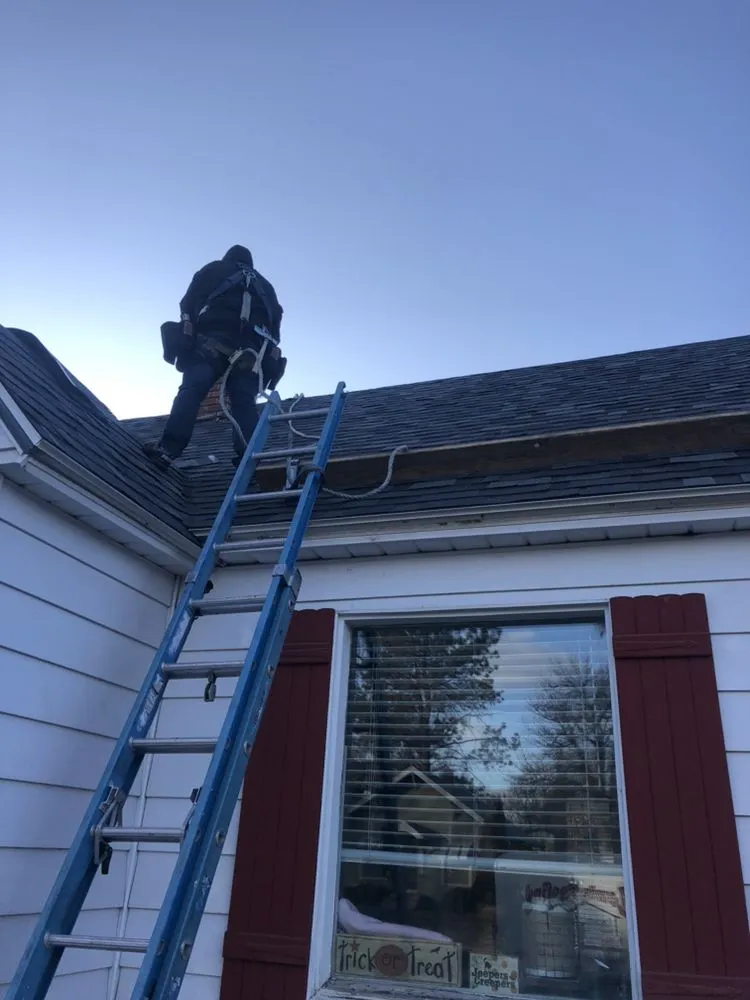 Slide of Lewis Roofing