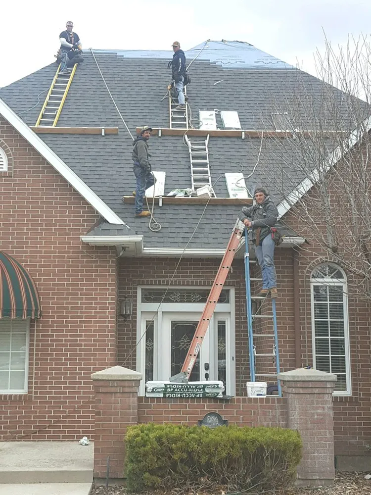 Slide of Lewis Roofing