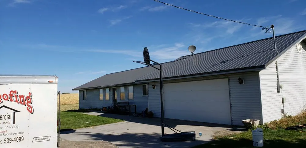 Slide of Lewis Roofing