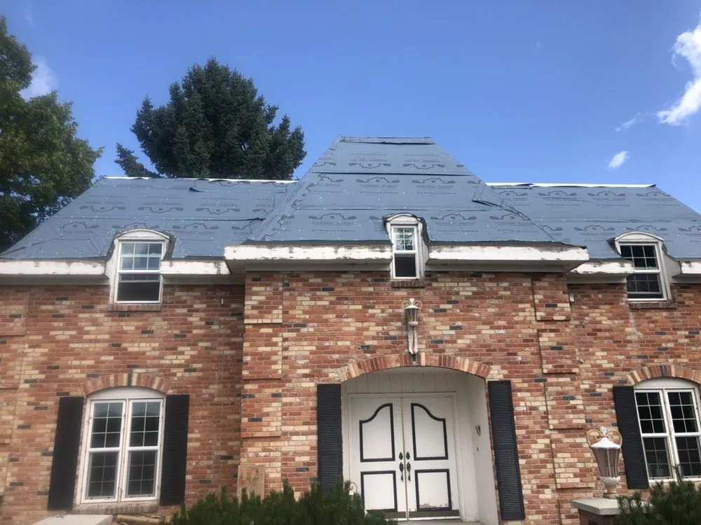 Slide of Lewis Roofing