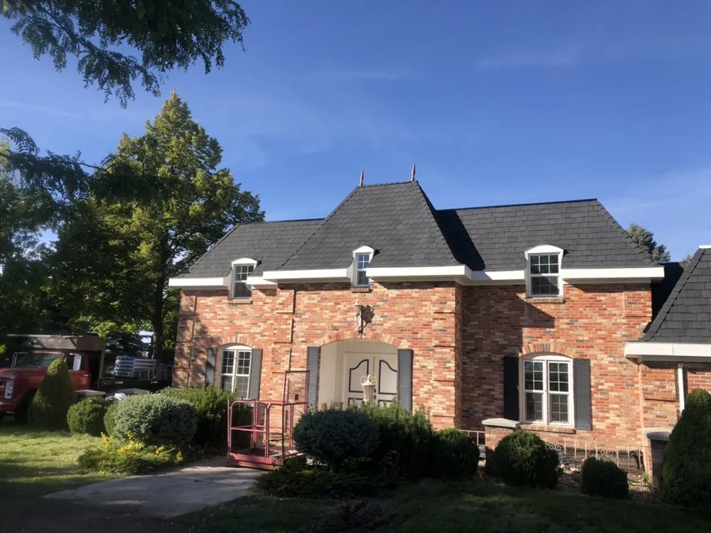 Slide of Lewis Roofing