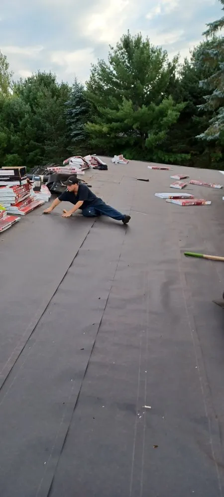 Licensed roof installation after storm damage in Lewiston, MI by Lewiston Local Handyman Services