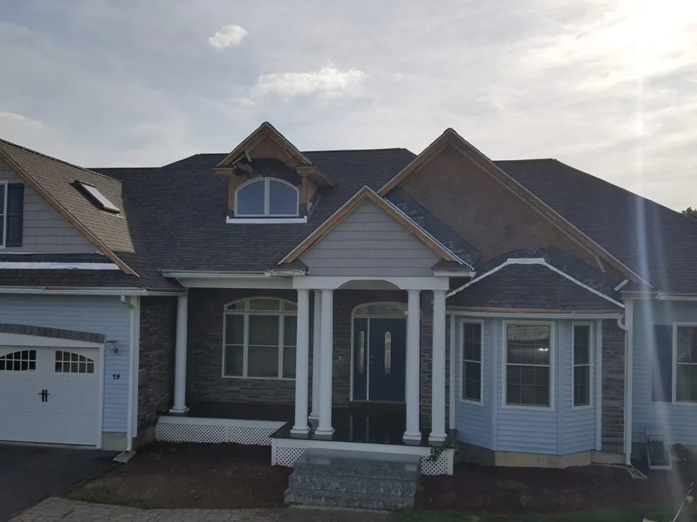 Slide of LG Roofing & Siding Services