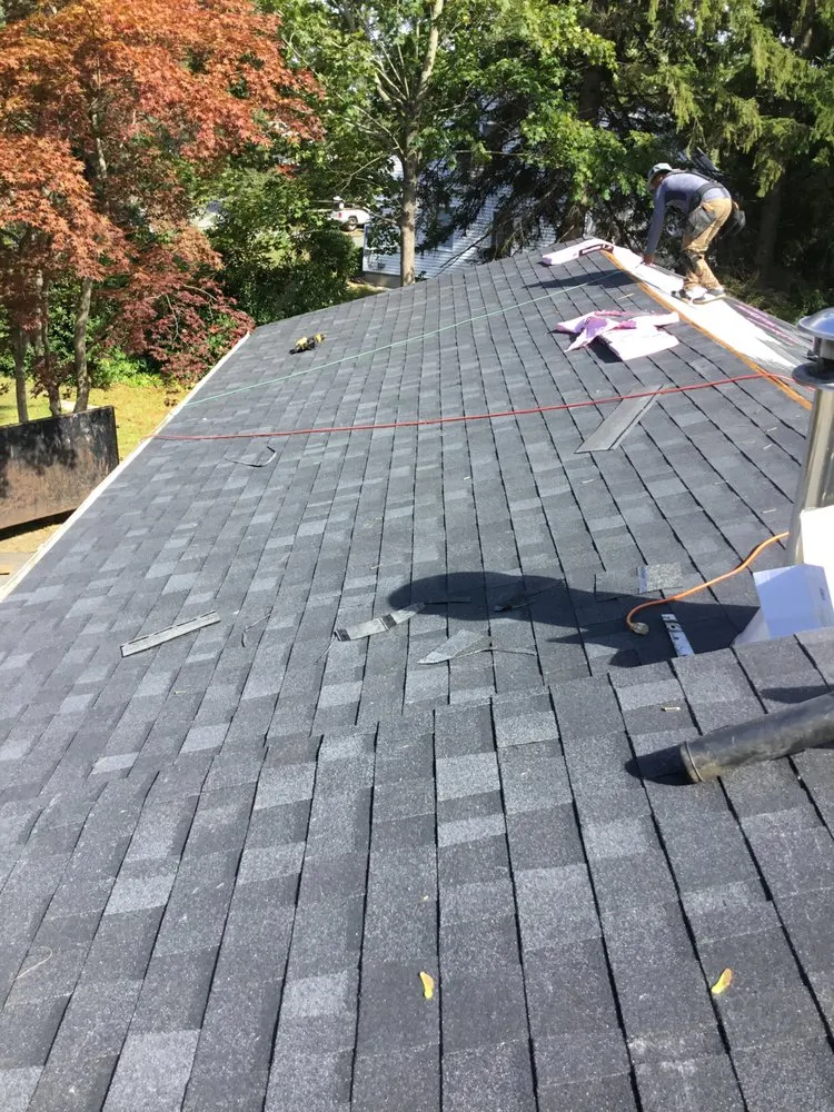 Slide of LG Roofing & Siding Services