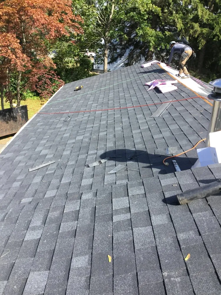 Slide of LG Roofing & Siding Services