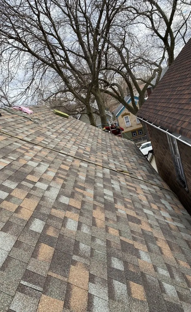 Slide of LGC Roofing Contractors