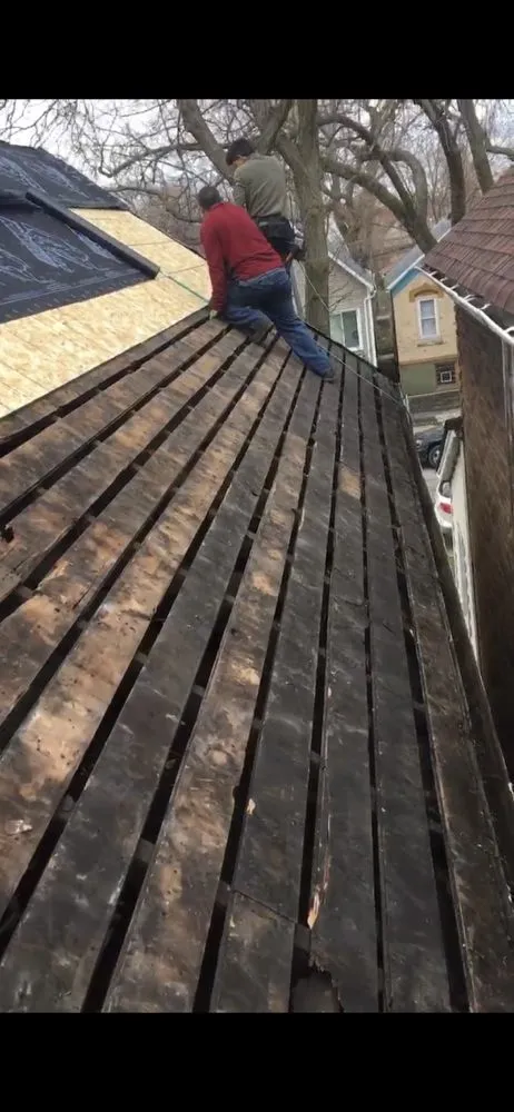 Slide of LGC Roofing Contractors