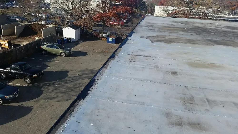 Emergency storm damage roof repair after storm damage in St. James, NY by LI Roof Repair
