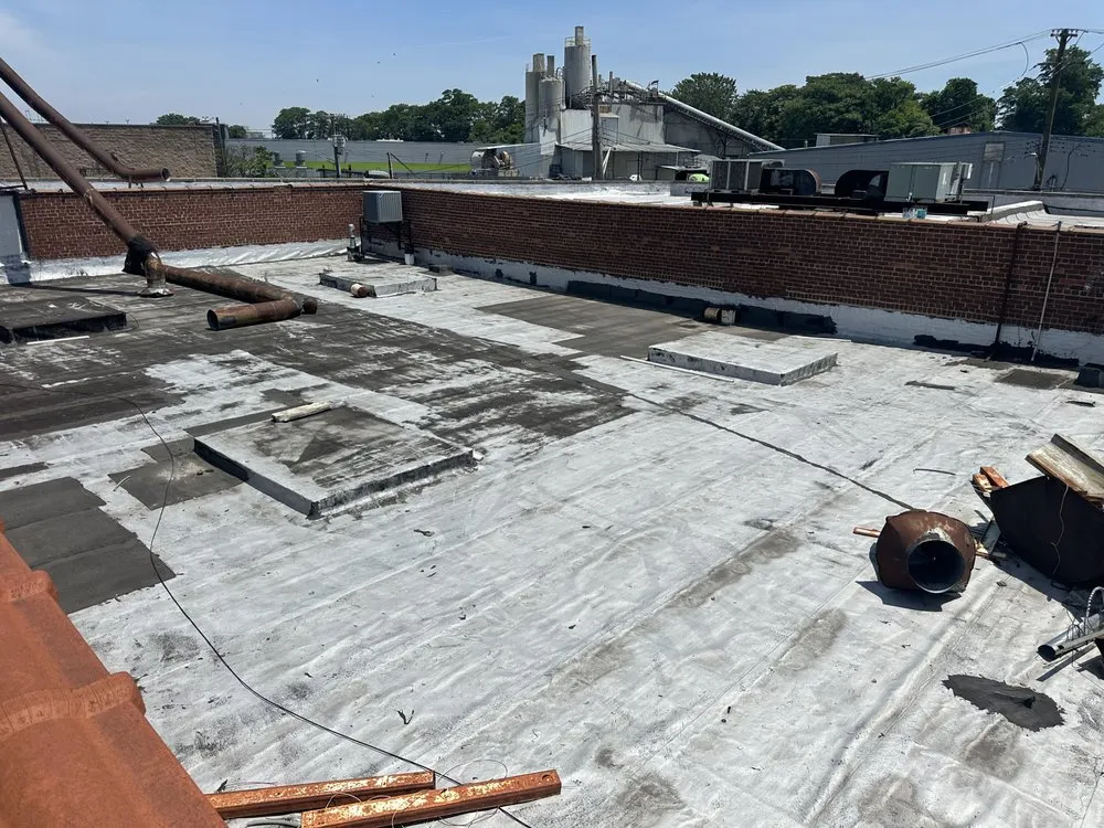 Local shingle roofing service in Hollis, NY by Liberty Brickpointing And Roofing