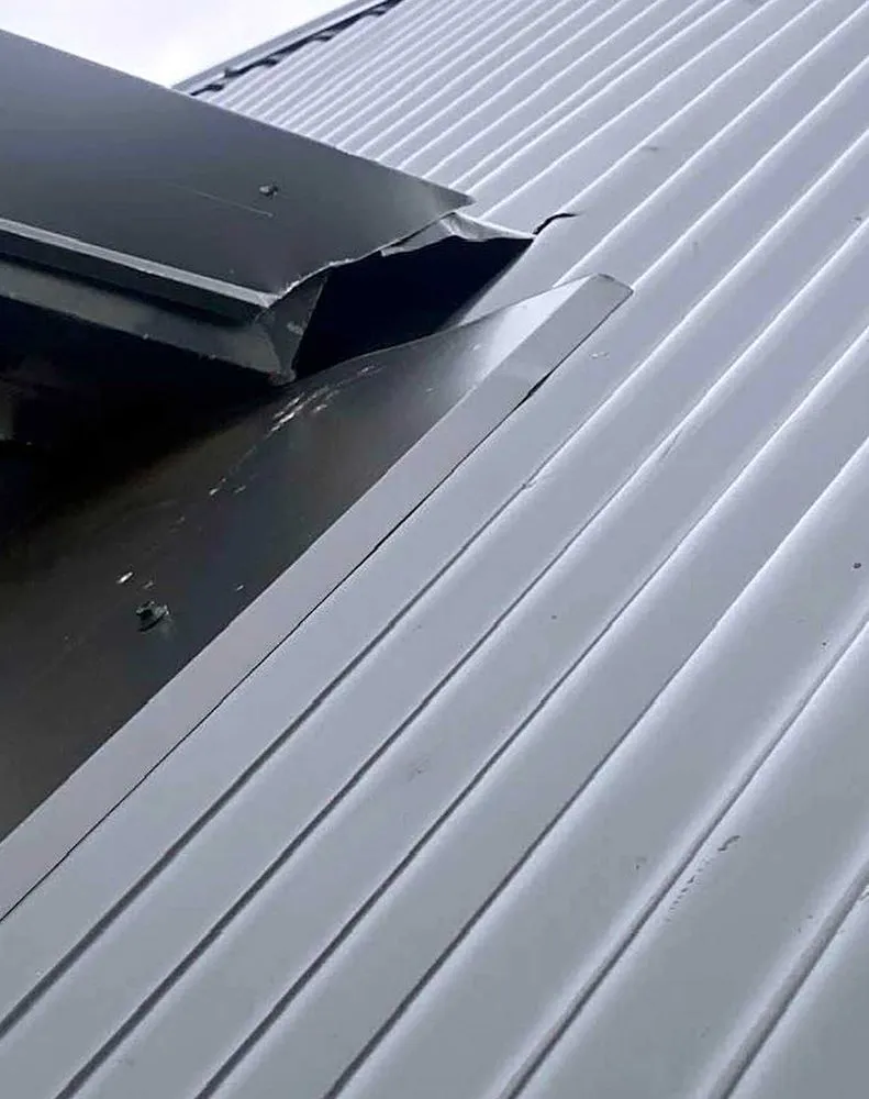 Slide of Liberty City Roofing