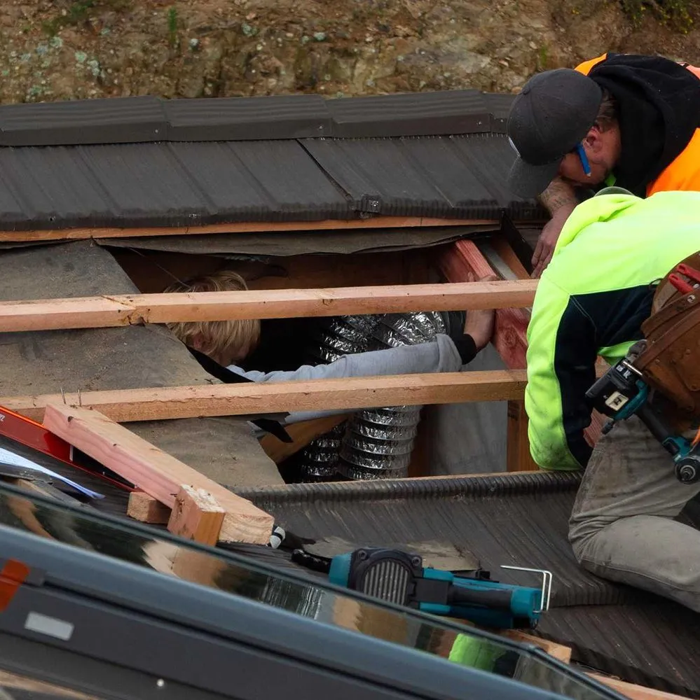 Slide of Liberty City Roofing