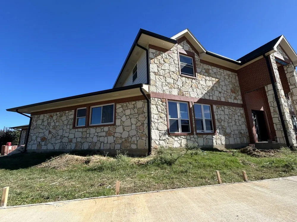 Slide of Liberty Gutters