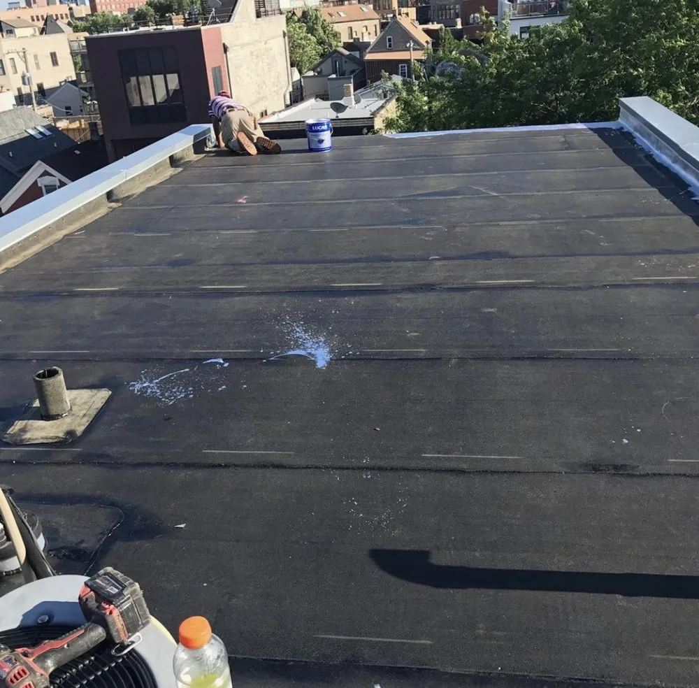 Slide of Liberty Roofing & Tuck Pointing