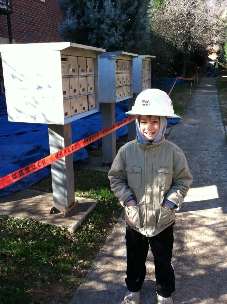 Slide of Liberty Roofing