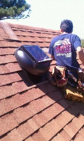 Slide of Liberty Roofing