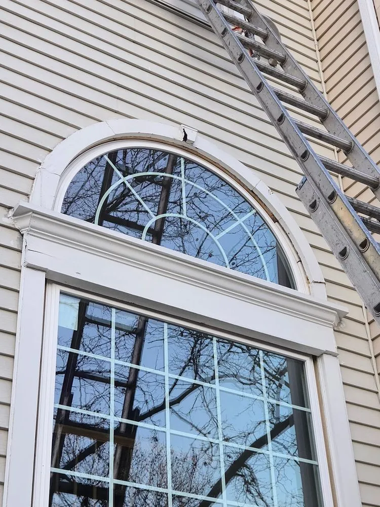 Slide of Liberty Roofing Window & Siding