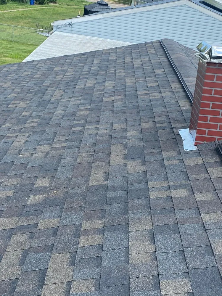 Slide of Liberty Roofing Window & Siding